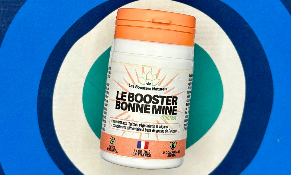 Flacon du Booster Bonne Mine des Boosters Naturels sur fond bleu, illustrant l&